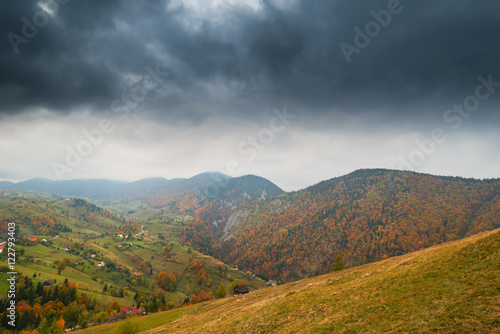 Pretty autumn scenery and autumn foliage in remote rural area in the mountains of Transylvania, Romania © Calin Tatu