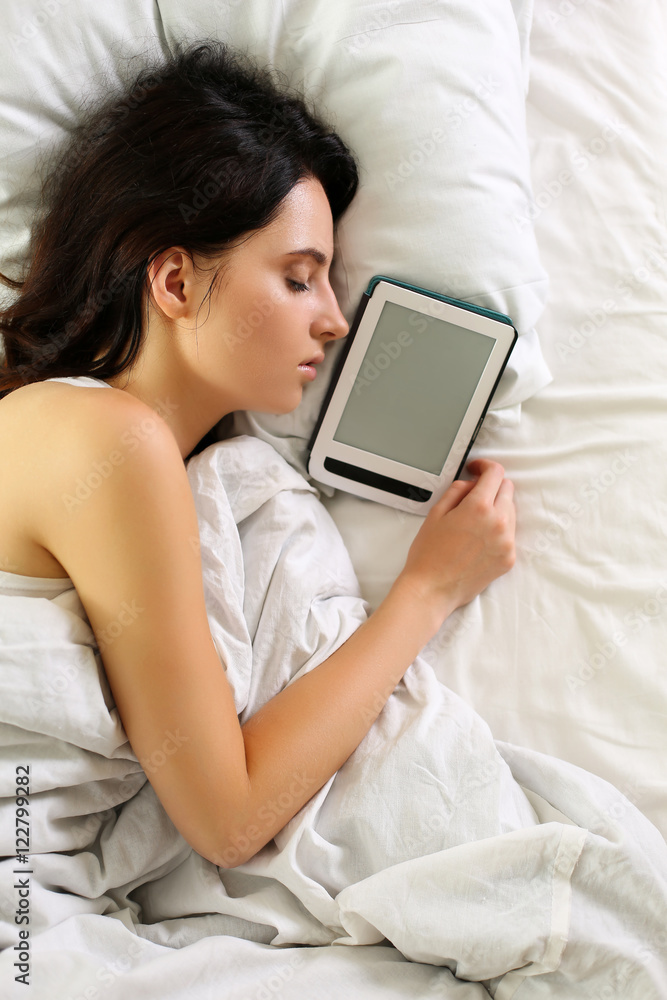 Young beautiful brunette woman portrait lying in bed sleeping Young beautiful brunette woman portrait lying in bed sleeping