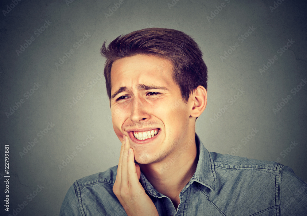 man with toothache crown problem about to cry from pain man with toothache crown problem about to cry from pain