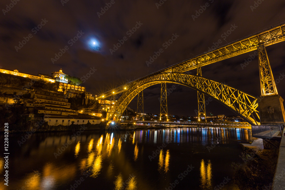 Long exposure night view of Dom Luís I Bridge in Porto, Portugal
