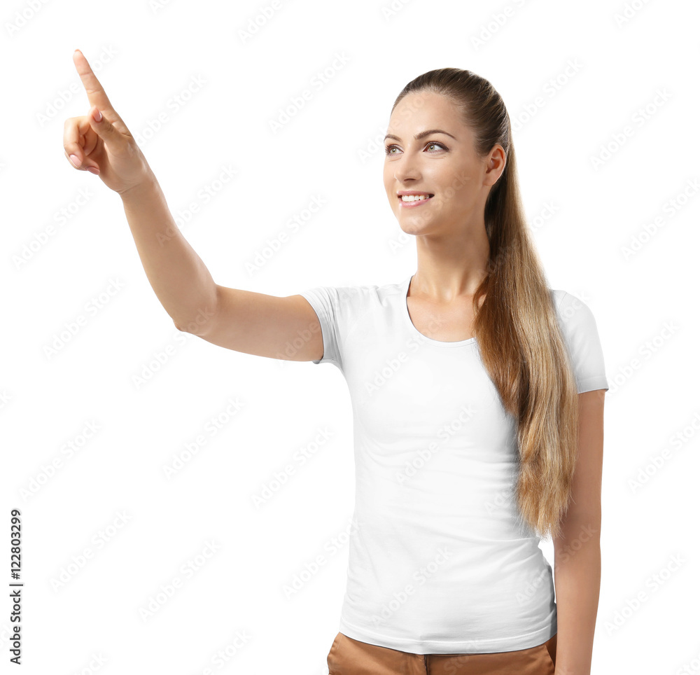 Beautiful girl pointing finger, isolated on white Beautiful girl pointing finger, isolated on white