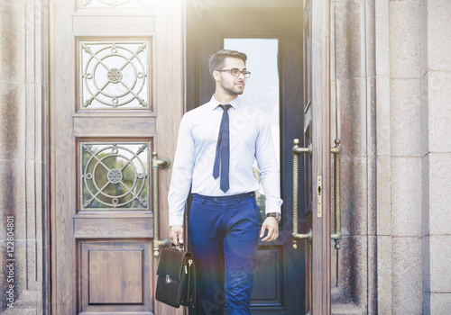 Handsome young lawyer  leav...
