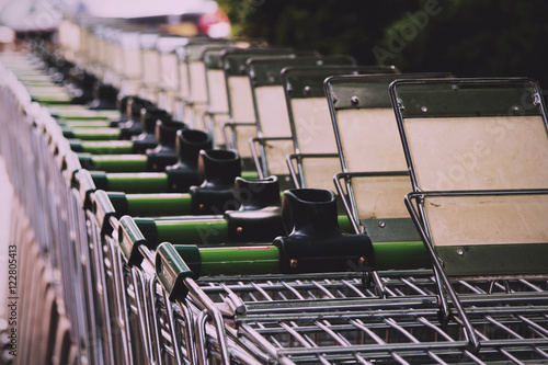BEACONSFIELD, ENGLAND - JUNE 2016: Waitrose shopping trollies ou