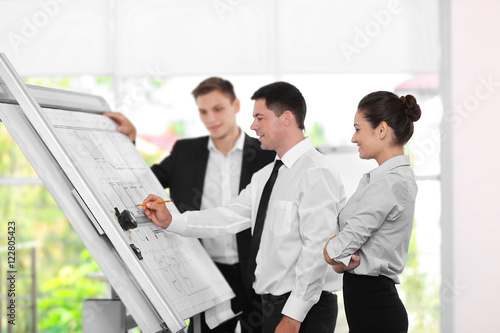 Team of young engineers wor...