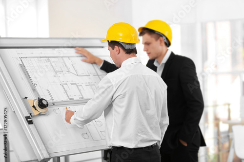Two male engineers working ...