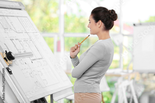Young female engineer worki...