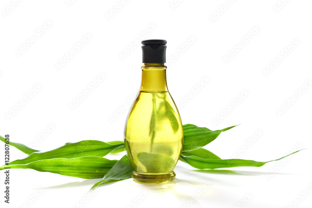 Spa treatment with bottle and green bamboo Spa treatment with bottle and green bamboo