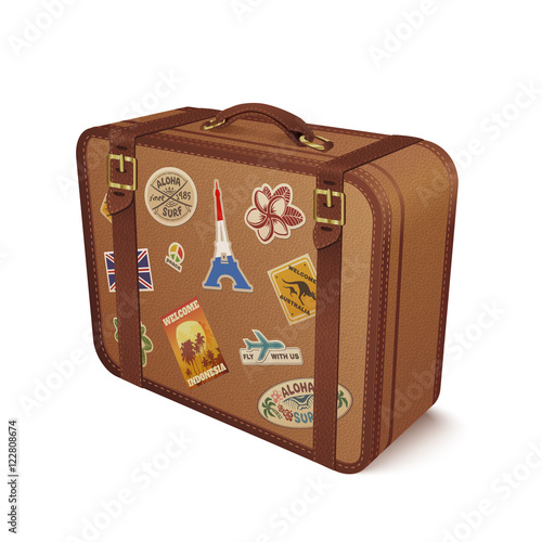 Vector old vintage leather suitcase with travel stickers