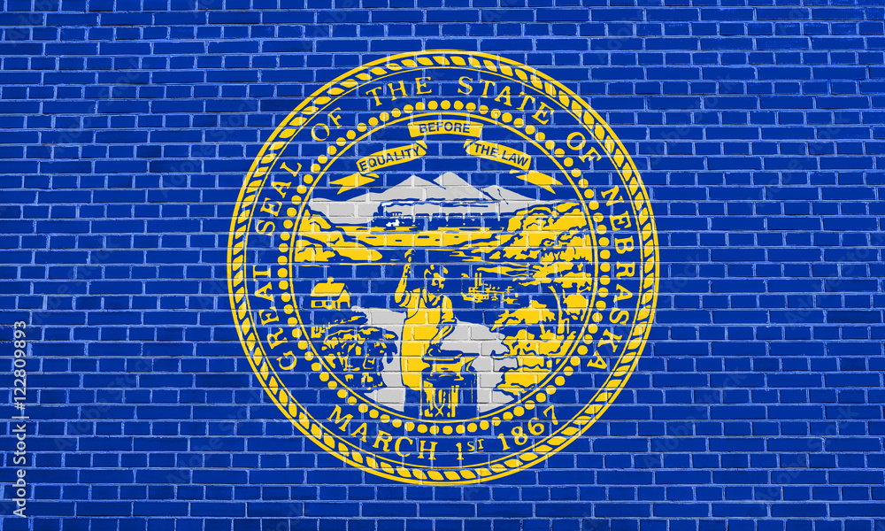 Flag of Nebraska on brick wall texture background