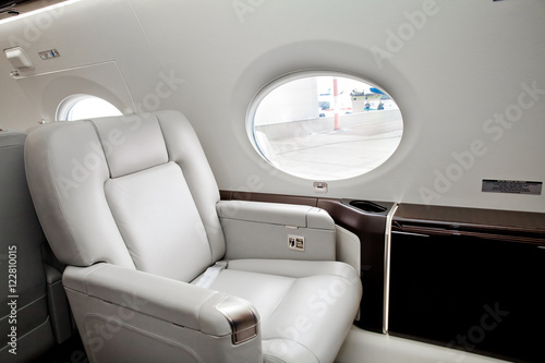 Outside view in aircraft window, business jet flight