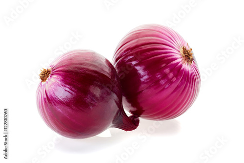 Two red onions on white