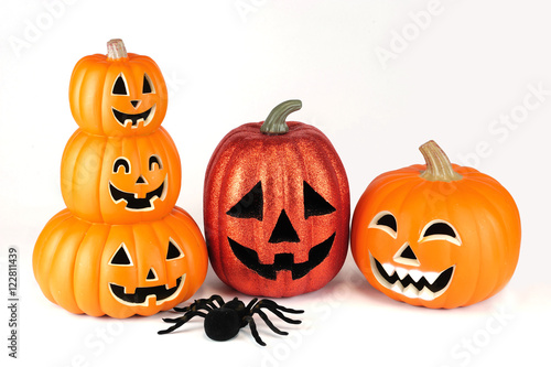 Halloween pumpkin lantern and spider isolated on white background