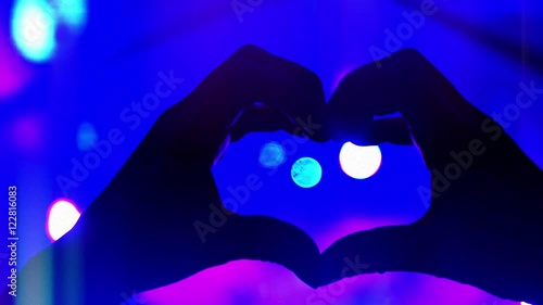 4K Woman Hands in Shape of Heart, Silhouette with Purple Stage Lights Background