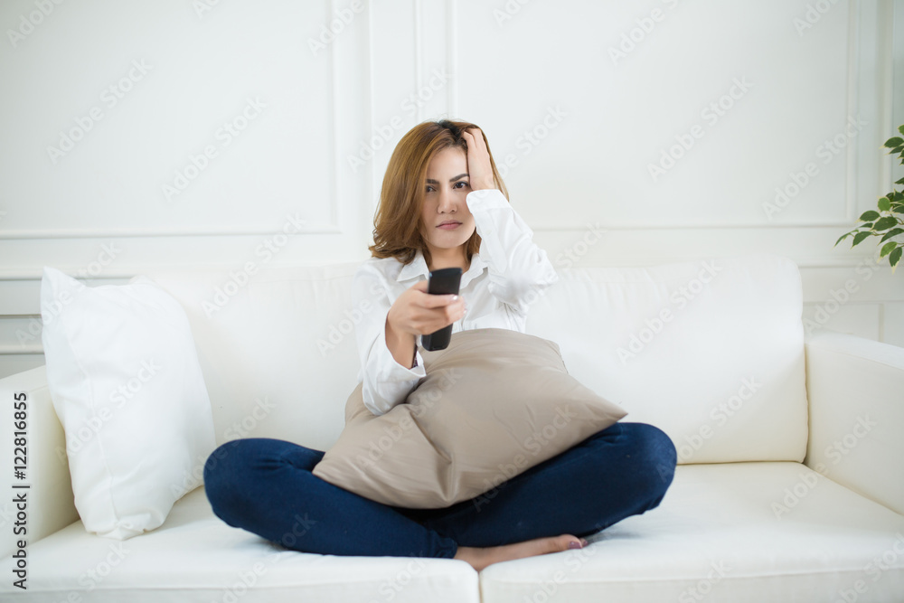 beautiful asia woman watching television hand holding remote beautiful asia woman watching television hand holding remote