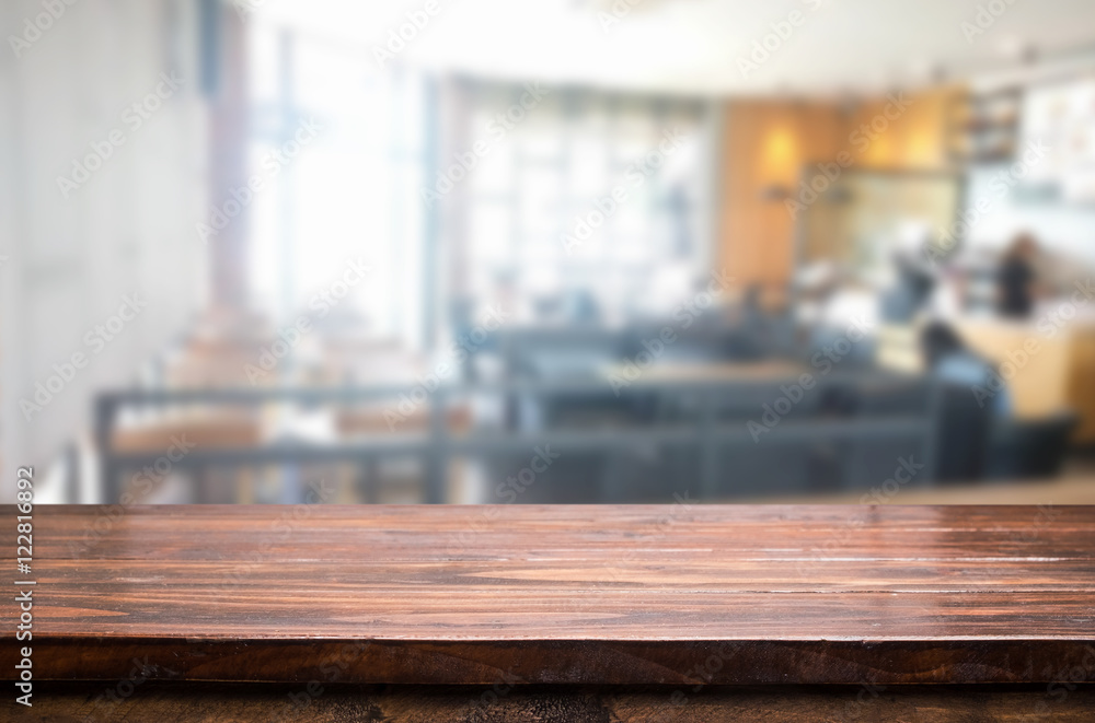 Selected focus empty brown wooden table and Coffee shop blur bac Selected focus empty brown wooden table and Coffee shop blur bac