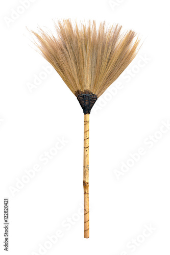 Straw broomstick isolated on white background