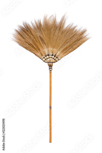 Natural straw broomstick isolated on white background