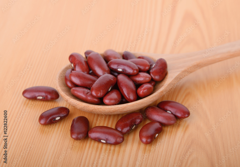 red bean in wood spoon on wood table red bean in wood spoon on wood table