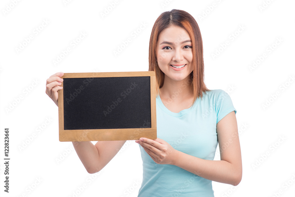 Young asian student woman holding a chalkboard isolated on white Young asian student woman holding a chalkboard isolated on white