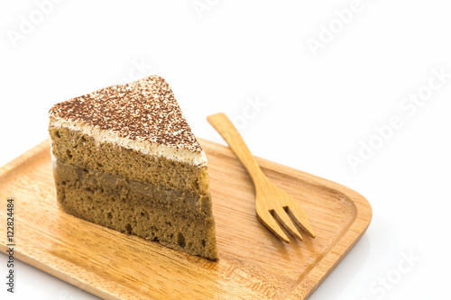 Coffee cake slice in wooden plate.