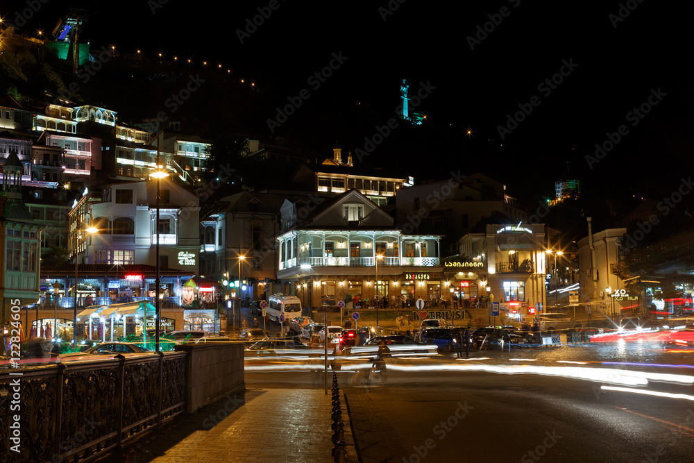 Fototapeta premium night city. Tbilisi, road, river