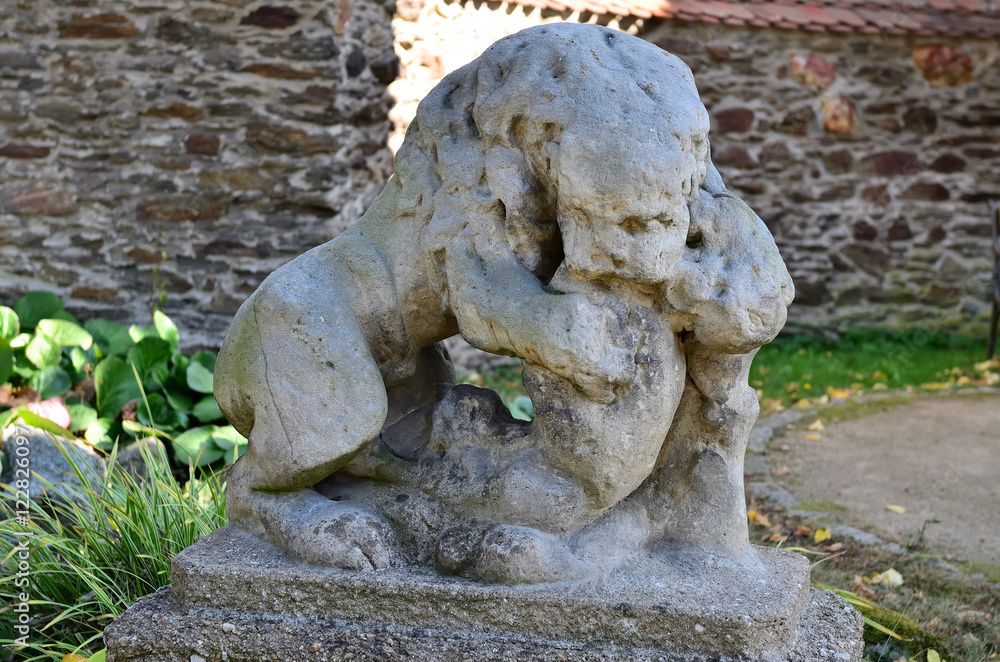 Statue of lion  /  Statue of the lion in the castle garden in Zruc nad Sazavou in Czech republic
