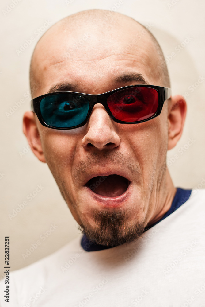 Portrait Of A Young Man Wearing 3d Glasses On A white Background Portrait Of A Young Man Wearing 3d Glasses On A white Background
