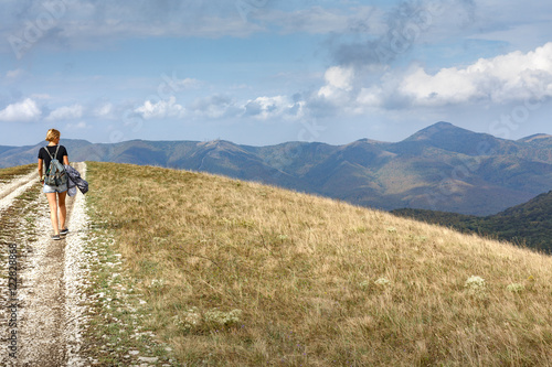 Woman hiking in the mountains