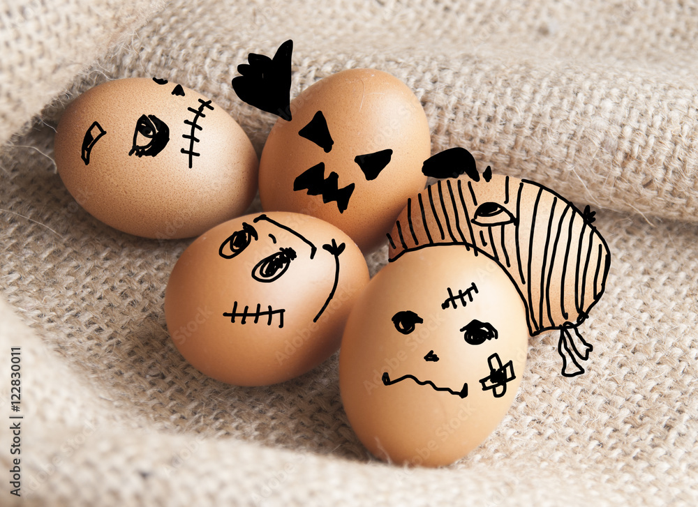 Naklejka premium Cartooning on eggs ,devils on Halloween concept