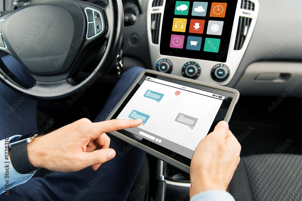 close up of man with tablet pc in car close up of man with tablet pc in car