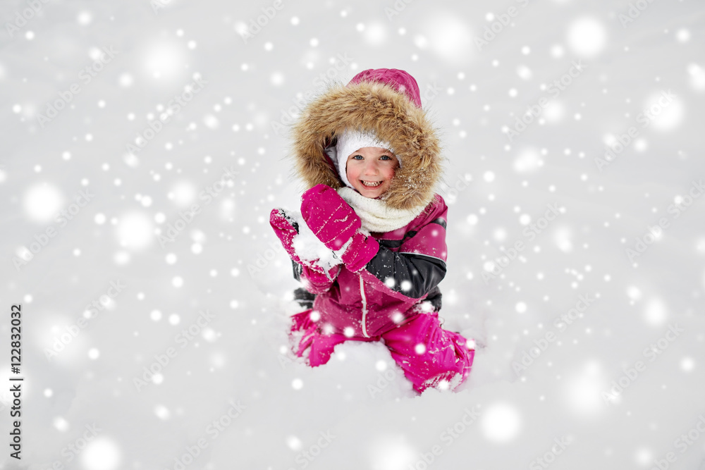 f happy little child or girl with snow in winter f happy little child or girl with snow in winter