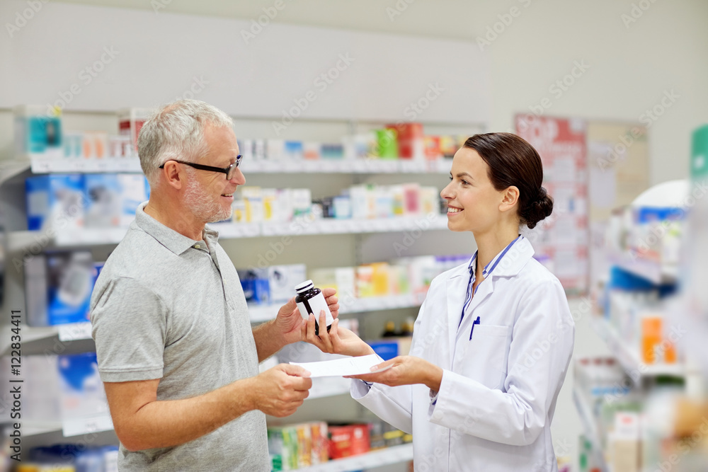 pharmacist and senior man buying drug at pharmacy