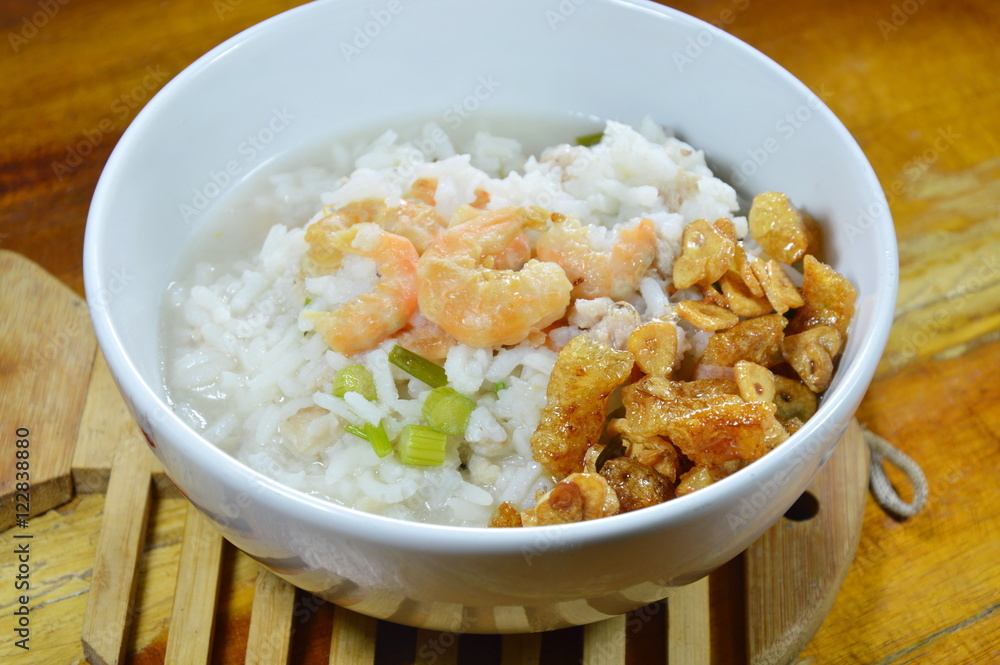 rice porridge with minced pork and dried shrimp topping fried garlic on bowl rice porridge with minced pork and dried shrimp topping fried garlic on bowl