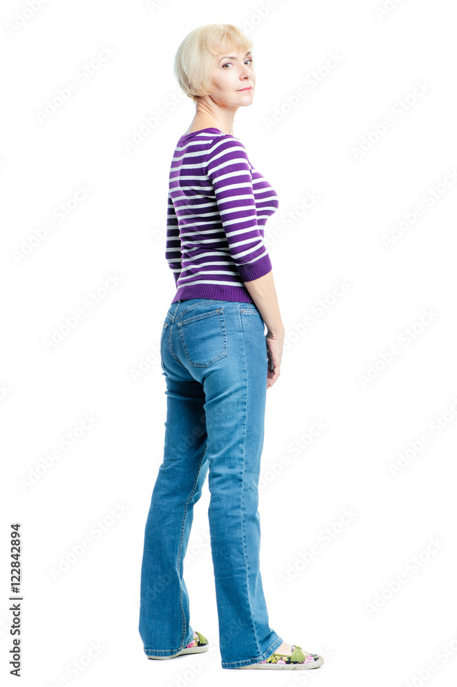 Full length portrait of attractive middle aged woman wearing casual. Back view. Isolated on white. Full length portrait of attractive middle aged woman wearing casual. Back view. Isolated on white.
