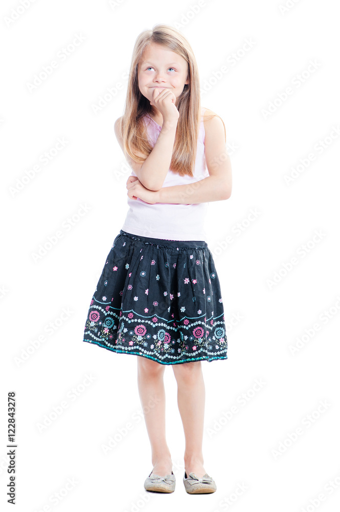 Little dreamer. Thoughtful pretty girl holding hand on chin. Isolated on white. Little dreamer. Thoughtful pretty girl holding hand on chin. Isolated on white.
