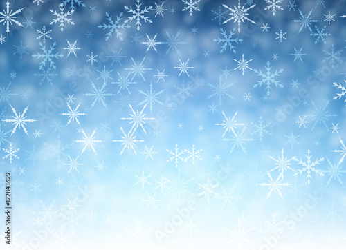 Blue winter background with snowflakes.