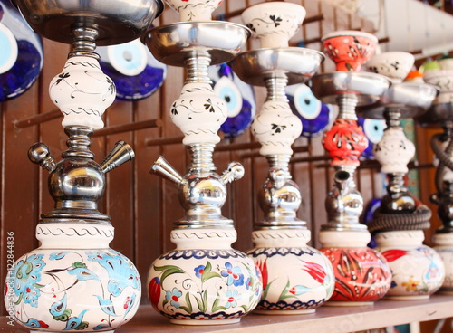 Group of hookahs on a shelf photo