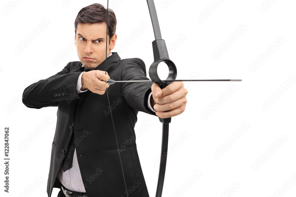 Businessman aiming with a bow and arrow Businessman aiming with a bow and arrow