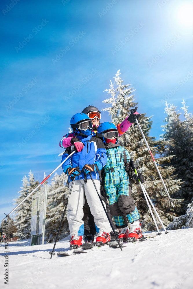  happy family ski team fun on beautiful mountain - obrazy, fototapety, plakaty 