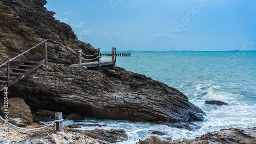 Wooden walkway for little adventure along the coastline to peninsula at Khao Laem Ya National Park , Rayong , Thailand