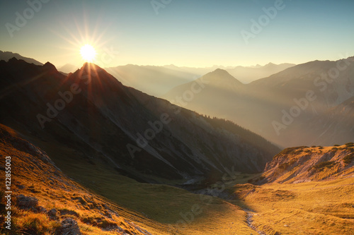 sunrise in rocky Alps