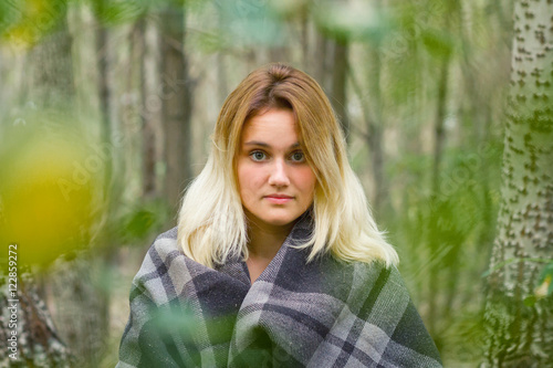 young woman in forest