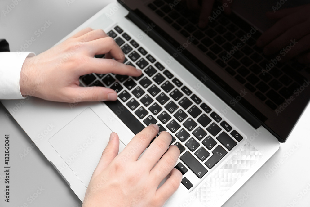 Man hands typing, closeup Man hands typing, closeup