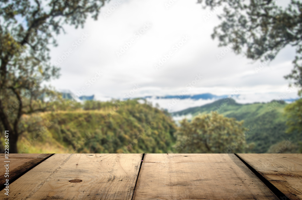 Beautiful and wood planks floor beside hill and cloud