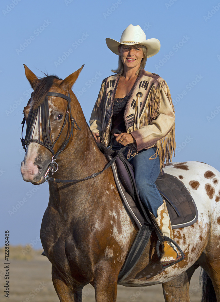 cowgirl on appaloosa horse
