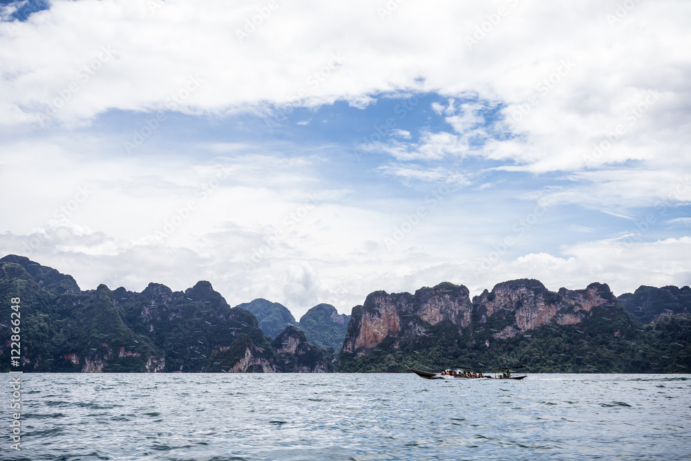 environment of mountains and river natural attractions in Ratchaprapha Dam at Khao Sok National Park, Surat Thani Province, Thailand.