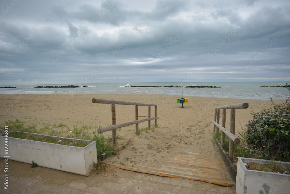 wooden walkway on the sand