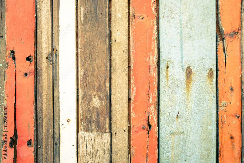 Wooden background and alternative construction material - Texture on multicolored wood panel in modern fashion structure - Retro seamless backdrop pattern - Soft vintage desaturated filtered look Wooden background and alternative construction material - Texture on multicolored wood panel in modern fashion structure - Retro seamless backdrop pattern - Soft vintage desaturated filtered look