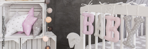 Cuddly baby room decorations in pastel colous photo