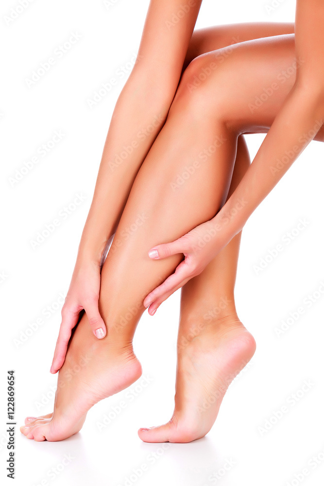 Female legs and hands, white background, isolated Female legs and hands, white background, isolated